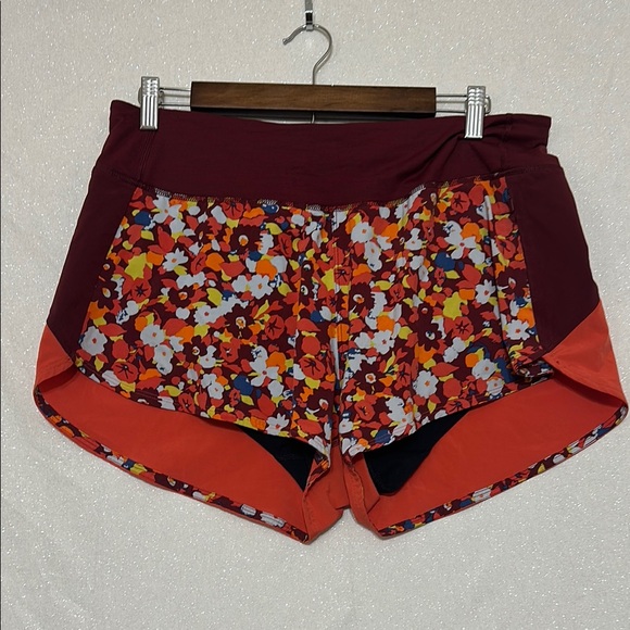 Vibrant Multi-Colored Athletic Shorts with Burgundy Side Panels - Picture 1 of 3